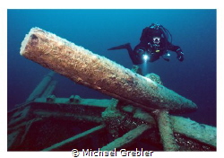 Diver at the starboard anchor of the Arabia lost near Tob... by Michael Grebler 